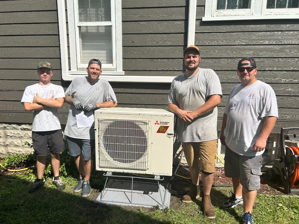 The A&E crew with a recent HVAC install