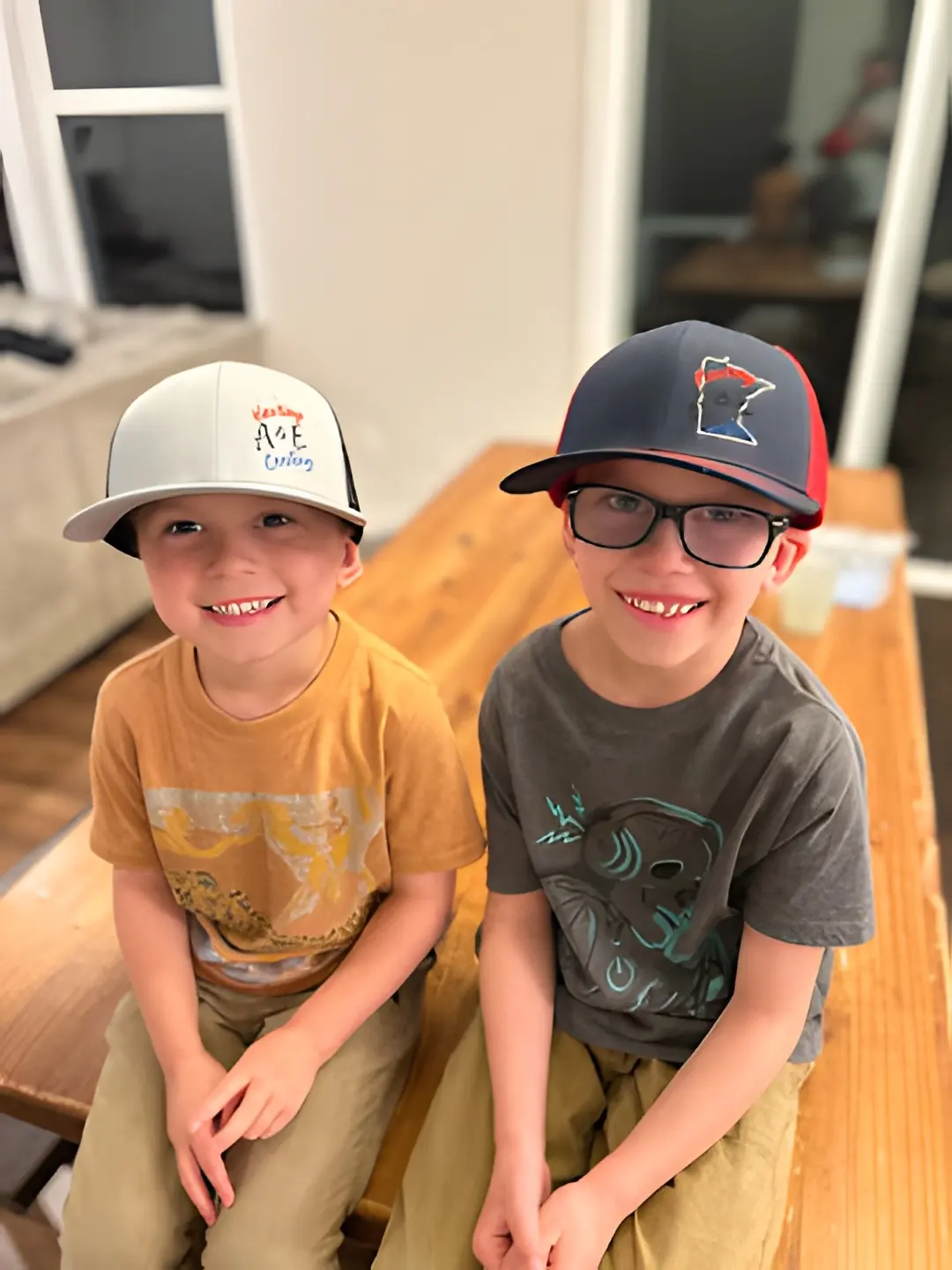 The A&E family — six kids in A&E hats